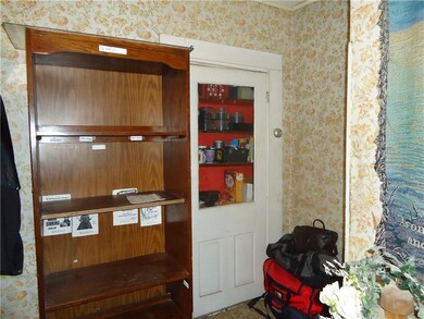 Dining room with built-in cabinet.