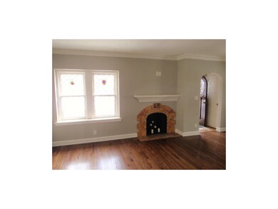 Original fireplace tile & leaded glass windows