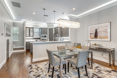 Dining area with custom chandelier