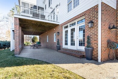Large patio and covered, outdoor dining area. Uple