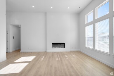 FIREPLACE!  CEILINGS AR 12' TALL!(PICTURE OF PREVIOUS BUILT HOME-OPTIONS, COLORS AND MATERIALS MAY VARY)