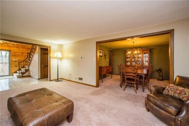Large living room flows from entry to dining room
