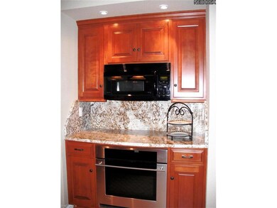 Kitchen serving bar with microwave and additional 