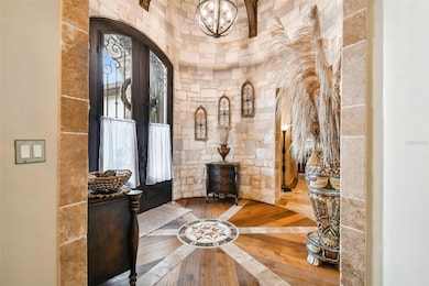 Magnificent front door with opening windows, still secure with the ornate metal work… Round room with real stone walls
