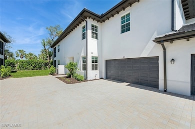 View of property exterior featuring decorative dri