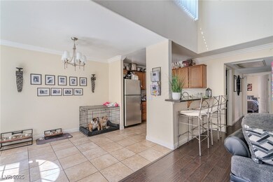 Kitchen with light tile patterned floors, freestan