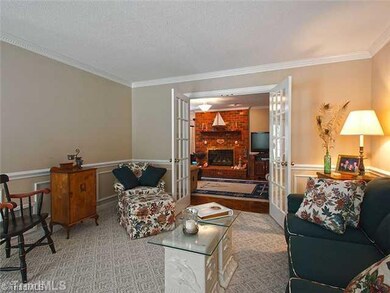 Living Room. The traditional floor plan has formal and casual living spaces.  The living room has french doors opening into the family room.  It could also serve perfectly as a home office.