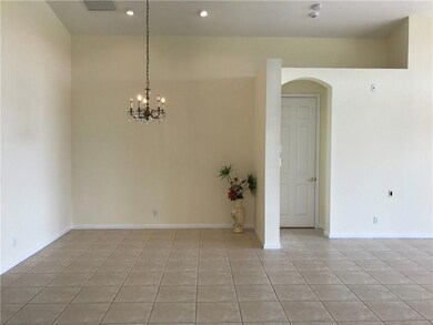 OVERSIZED TILED DINING ROOM FRESHLY PAINTED