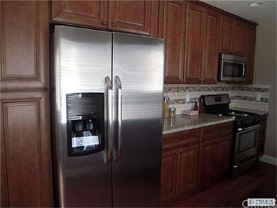 Custom cabinets, granite counters and stainless st