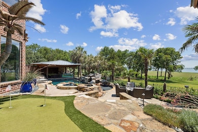 View of PUTTING GREEN, Cabana, swimming pool with 