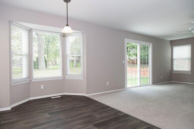Breakfast room with bay window, opens to family ro