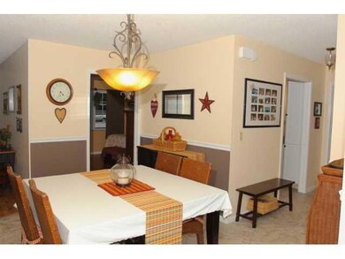 Dining Room. Dining room and open kitchen with a p