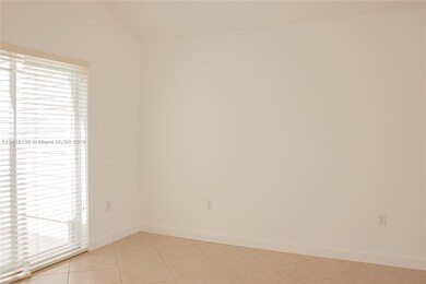 The Master Bedroom has a sliding glass door and va