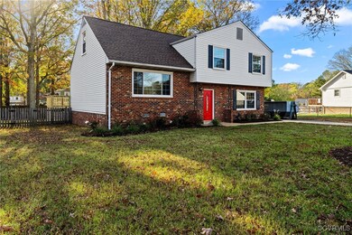 Tri-level home with a front yard
