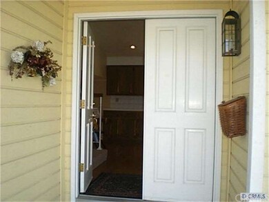 Double entry front doors to your wood entrance