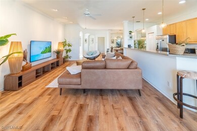 Living area with light wood finished floors, reces