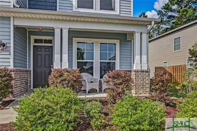 Covered front porch perfect for rocking chairs or 