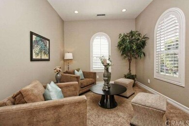 Living Room/Parlor with recessed lighting and plan