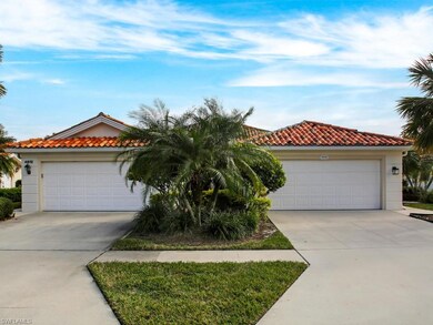 Duplex style with a poured concrete divider wall up to the peak of the roof