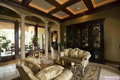 Gorgeous formal living with arched entries