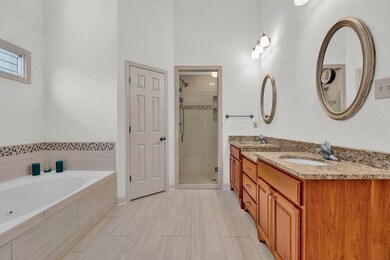 Enjoy a whirlpool soak or step into the roomy show