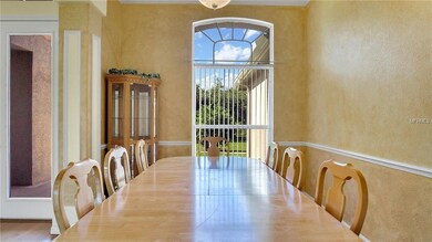 Spacious Formal Dining Room with elegant chair rai