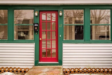 Front door leads onto a 3 season sun...