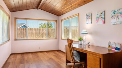 Family Room with vaulted wood ceiling