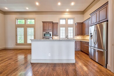 View of kitchen. Large breakfast room to left of k