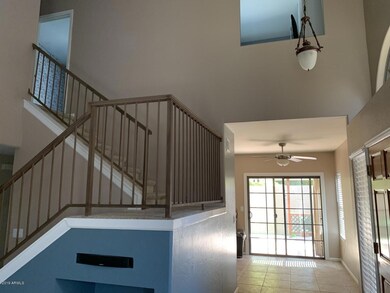 VIEW OF STAIRS FROM LIVING ROOM