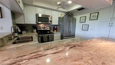 Bright white kitchen, new granite, stainless appli