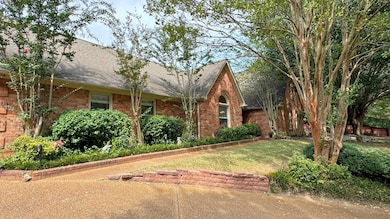 View of front of home featuring a front lawn