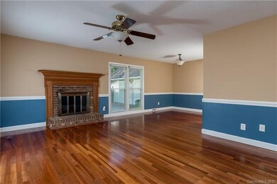 Living room and cozy dining area.  The hardwood fl
