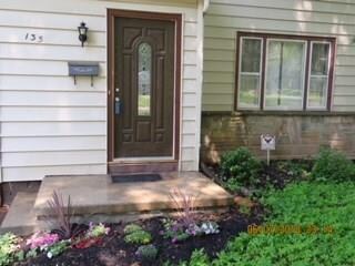 Nicely landscaped and beautiful stonework.