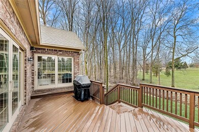 Spacious deck overlooking beautiful golf course lot. 