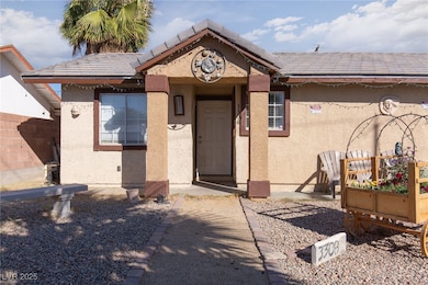 Doorway to property with stucco siding