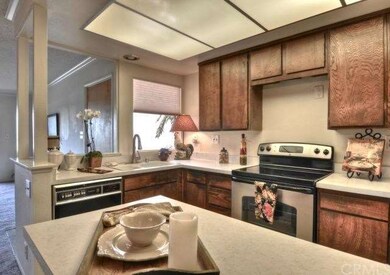 Kitchen with new tile floor, new blinds, and new r