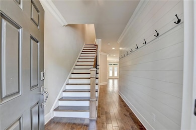 Love the shiplap feature wall with hooks