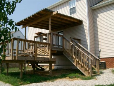 2 level rear deck with upper deck covered.