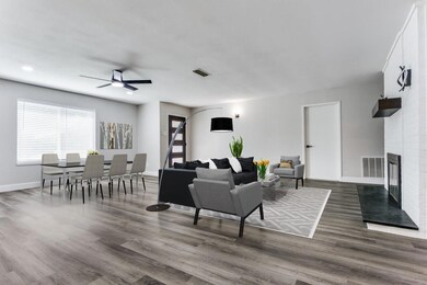 Living room featuring dark wood-type flooring, cei