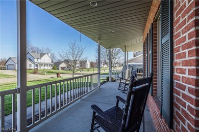 View of patio with a porch