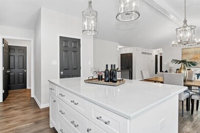 quartz tops, polished nickel sink faucet, lighting