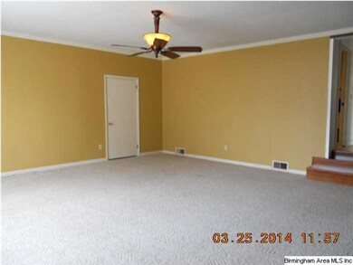 The huge sunken great room is great for family gat
