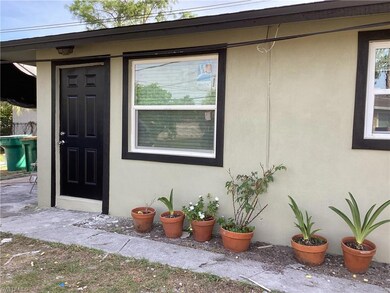 Doorway to property with stucco
