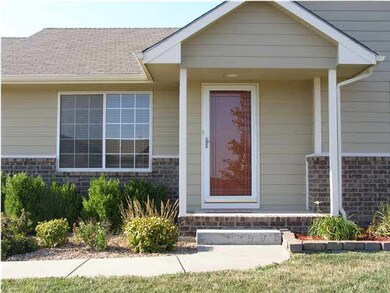 Sidewalk leading up to front door