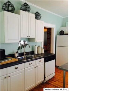 Kitchen features nice bright cabinetry