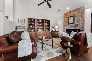 Living area with high vaulted ceiling, ceiling fa