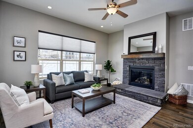 Stacked stone gas fireplace surround