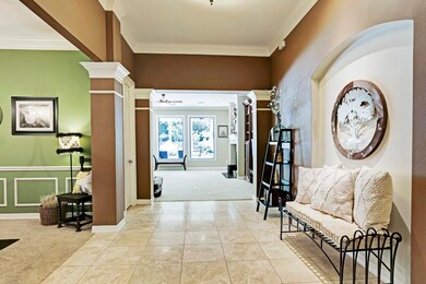 When entering, the formal dining is at the left of the foyer which features 