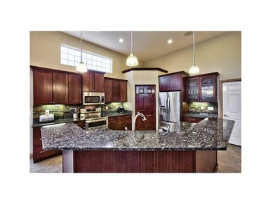 Kitchen. BLOWN GLASS INSERTS, GRANITE COUNTERS, CH